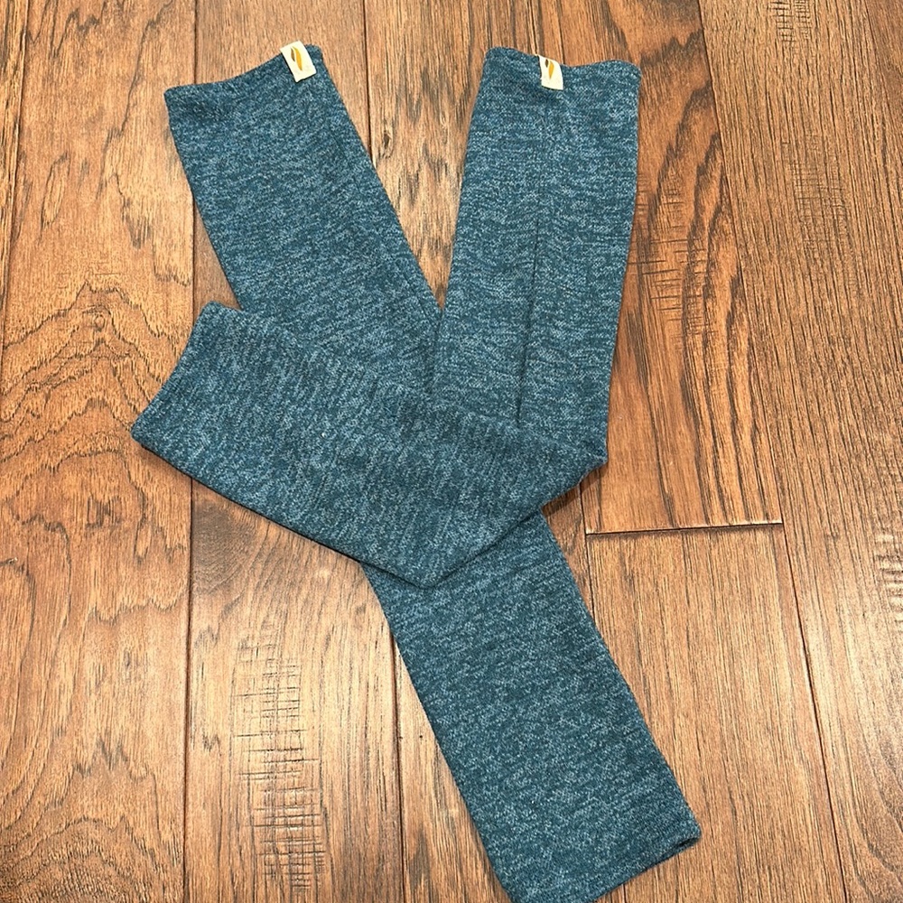 Rubia Wear leg warmers in a blue color.